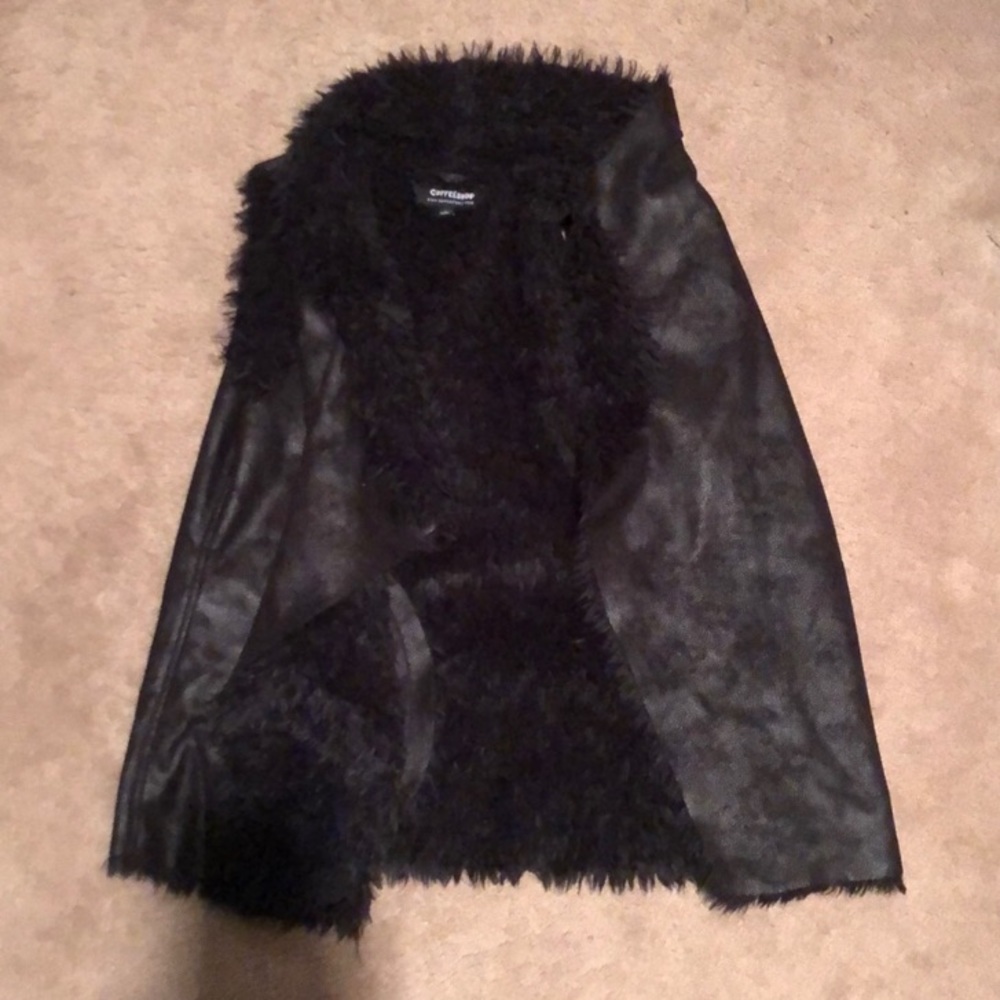 black fur vest
